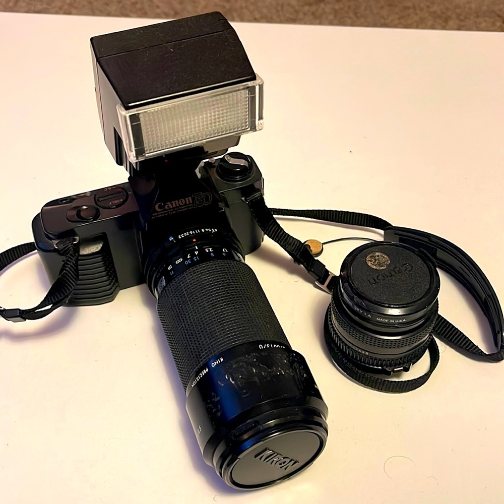 Canon T50  camera  with 200 mm 200 mm and 25 mm canon lens